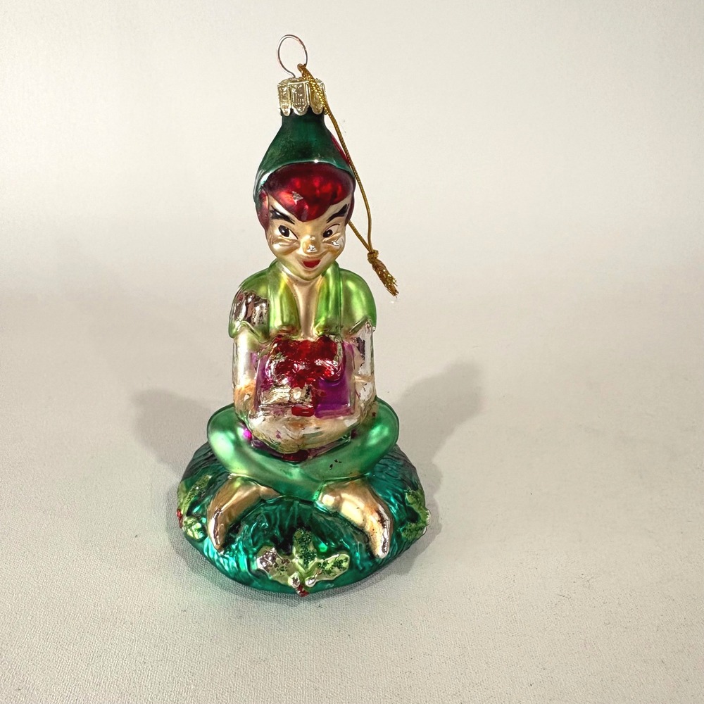 Vintage Peter Pan Glass Christmas Ornament Seated Figure with Gift Green Red